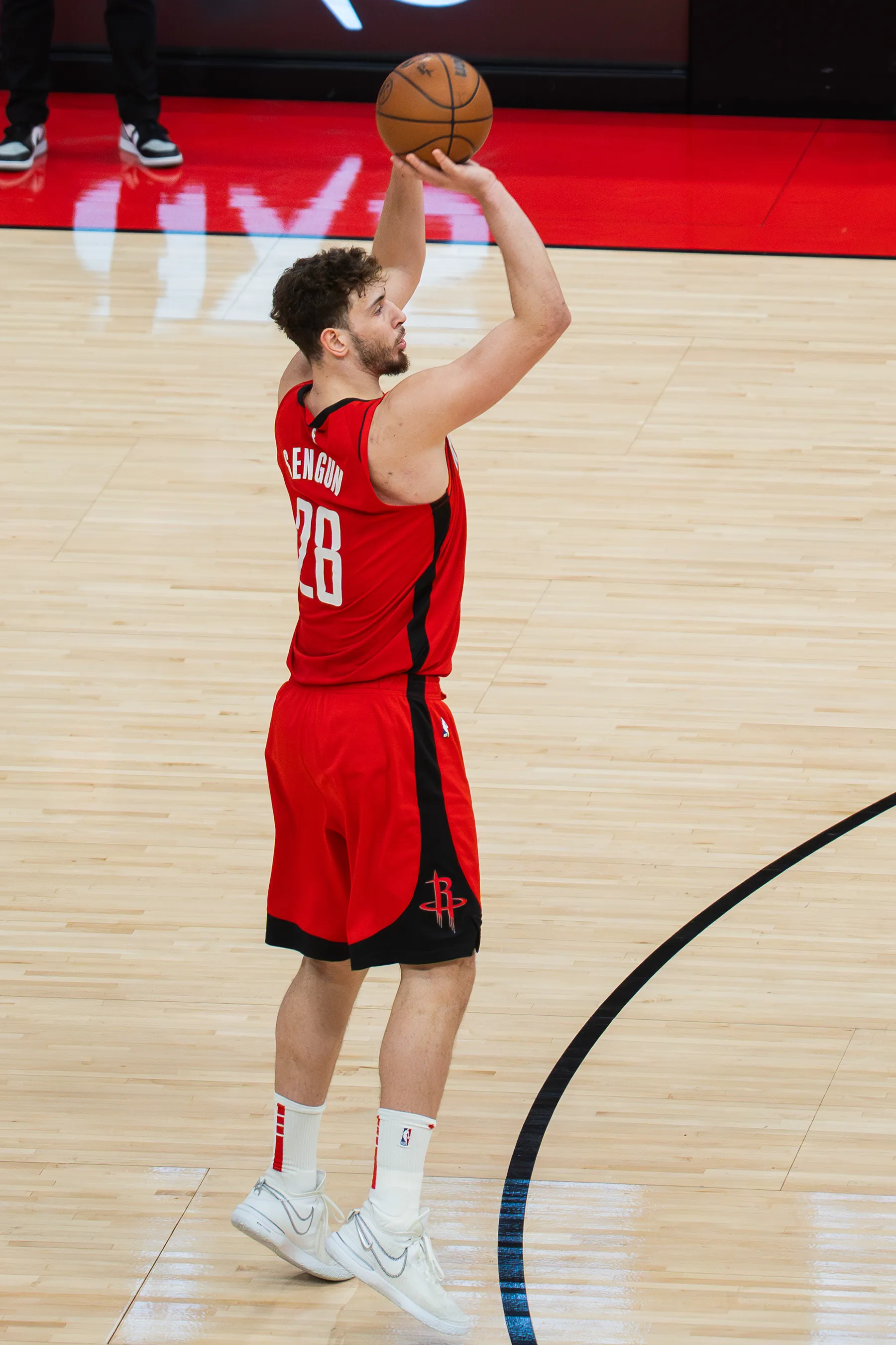 NBA basketball coverage — Şengün attacking the basket.